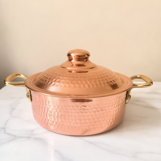 Kanz hand-hammered red copper cooking pot with brass handles, handmade in Fes by Cuivra