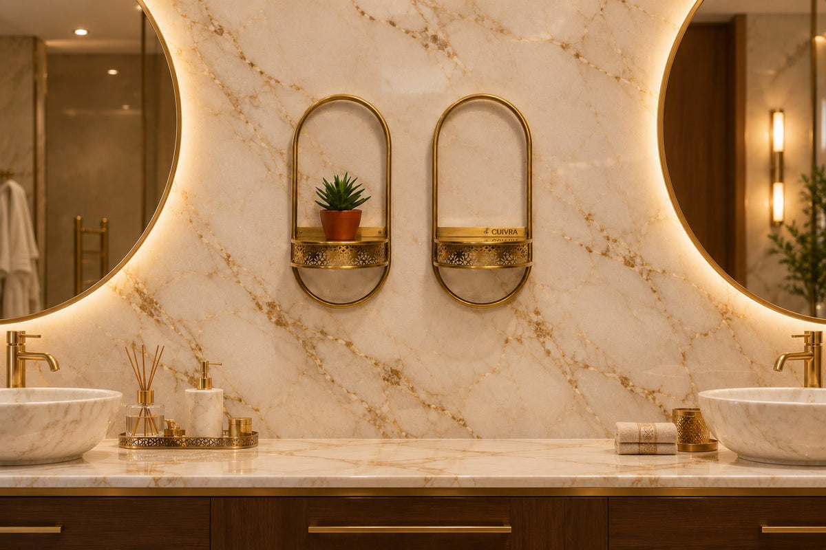 Aura brass shelves in a luxury marble bathroom between two mirrors