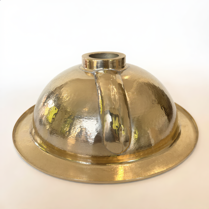 Underside of the brass vessel sink with drain outlet and overflow channel, Cuivra