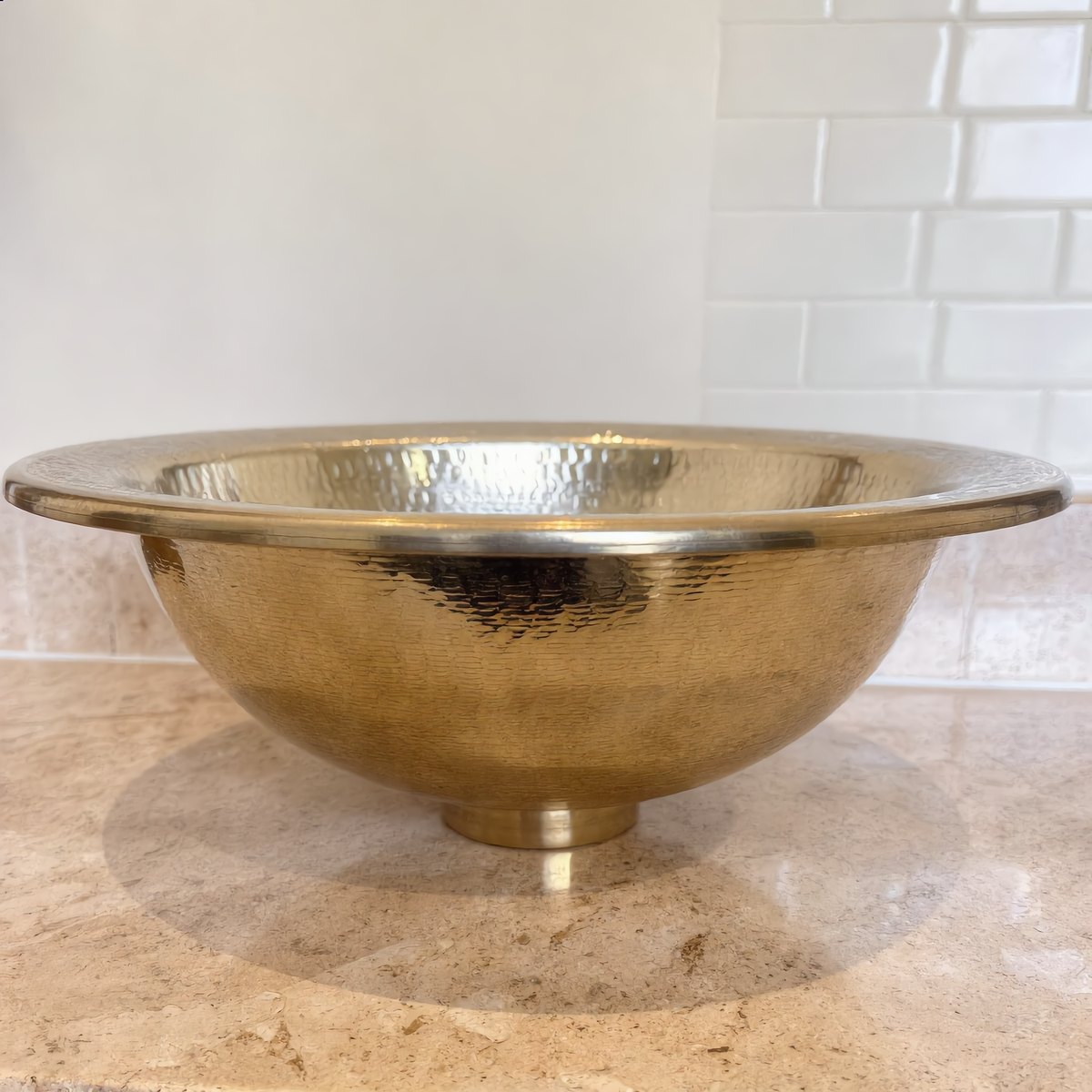 Moroccan brass vessel sink, hammered bowl and flat rim, side view, Cuivra